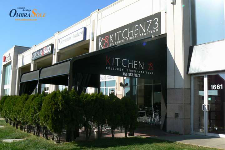 Attico fixed motorized awning with durable aluminum frame and high-quality vinyl fabric, designed for commercial outdoor spaces.