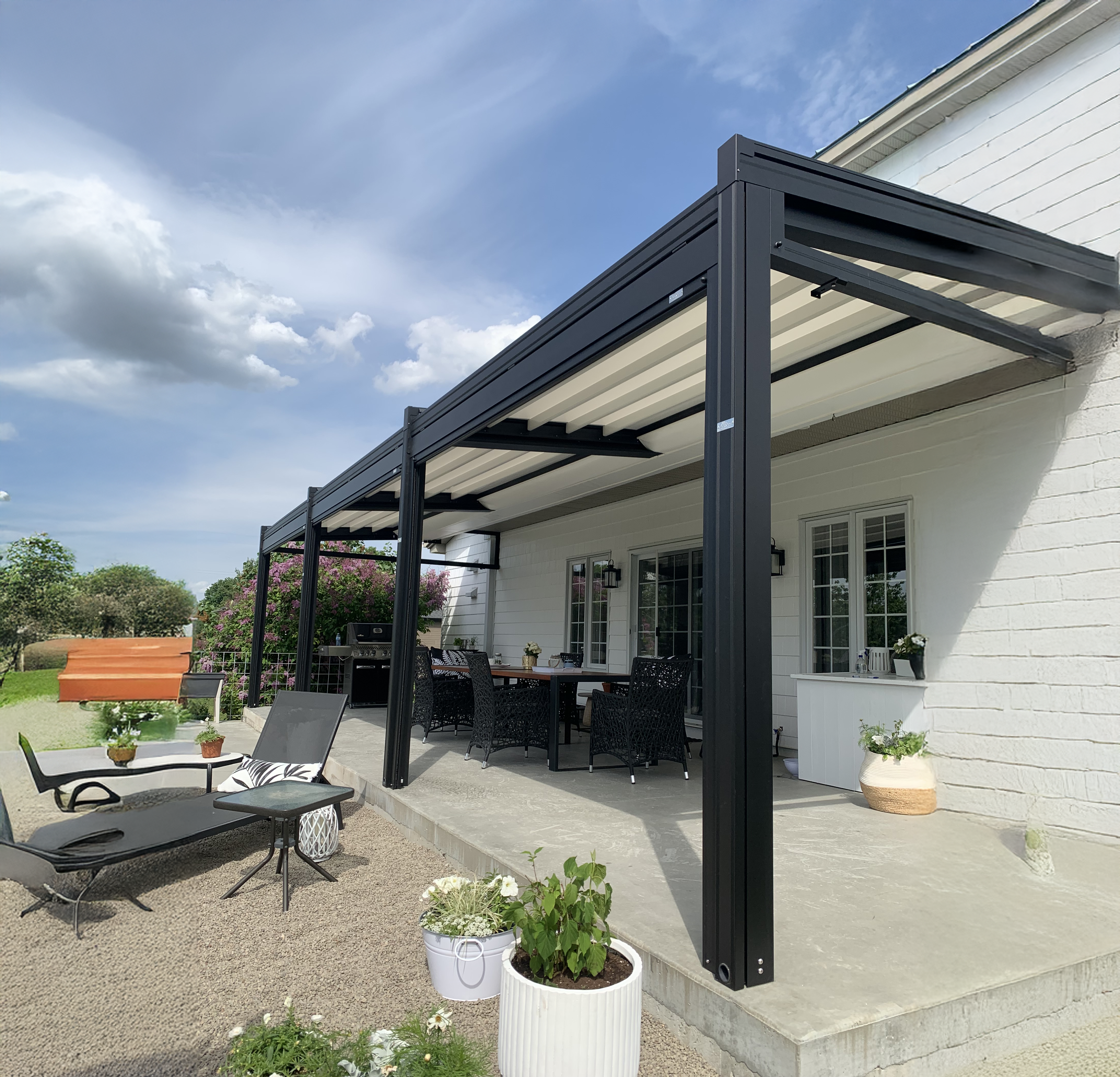 Pergola fixée a la maison